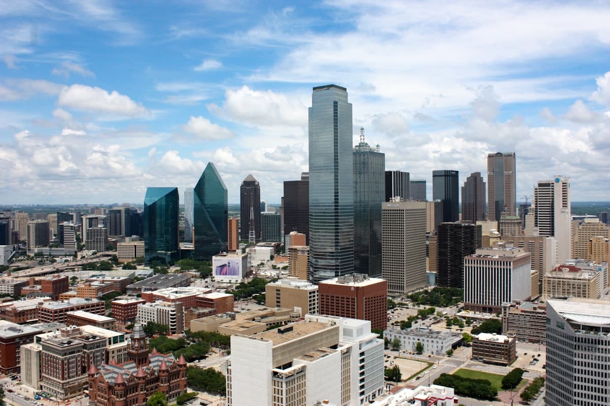 City buildings under blue sky during daytime — Dallas, TX