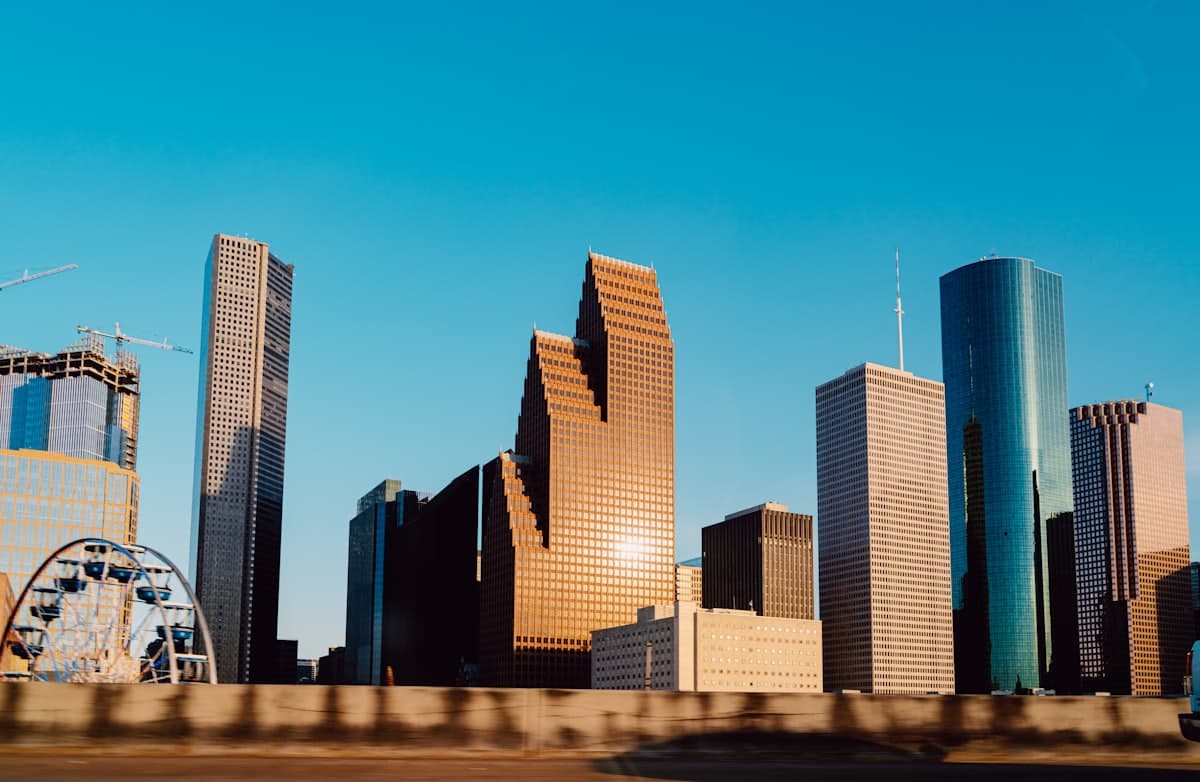 White and blue high rise building — Houston, TX