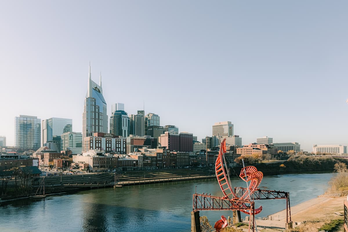 City skyline near body of water during daytime — Nashville, TN